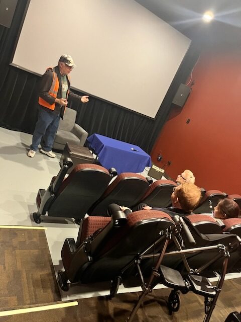 Jersey Devil Film Festival screening with audience and presenter in theater.