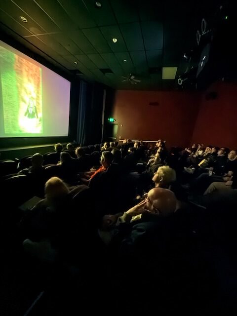 Audience watching a film screening at the Jersey Devil Fable Festival.